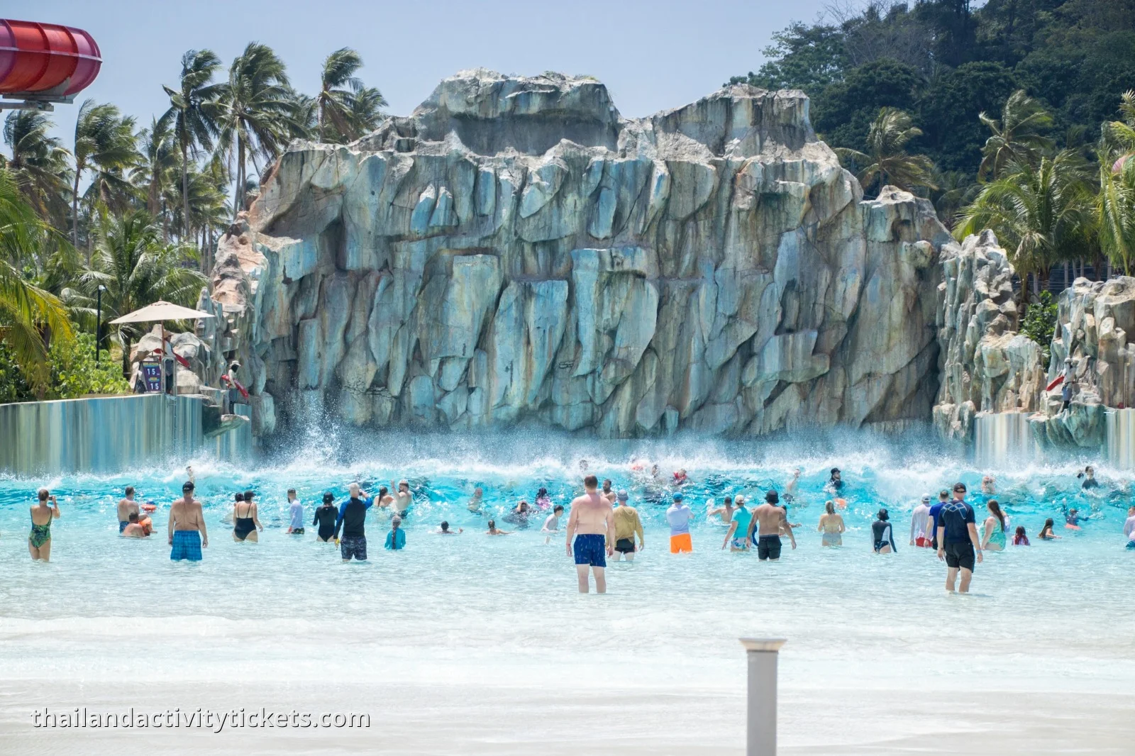 Groups of friends experiencing the 4-person 'Eagle Flyer' raft slide at Andamanda Phuket