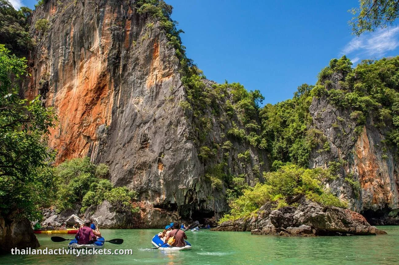 Paddling through scenic Phang Nga limestone caves James Bond Island