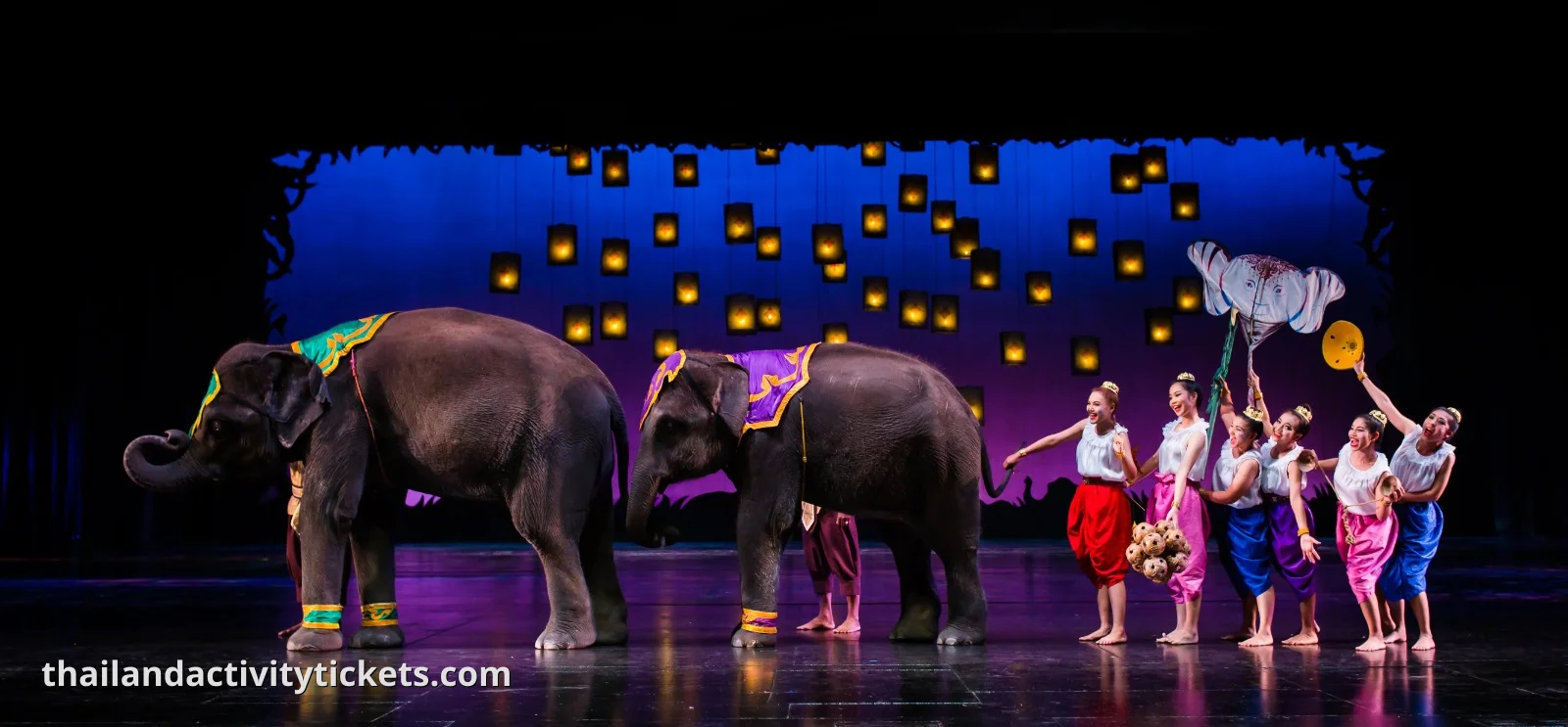 Traditional Thai cultural parade and street performance in Phuket FantaSea