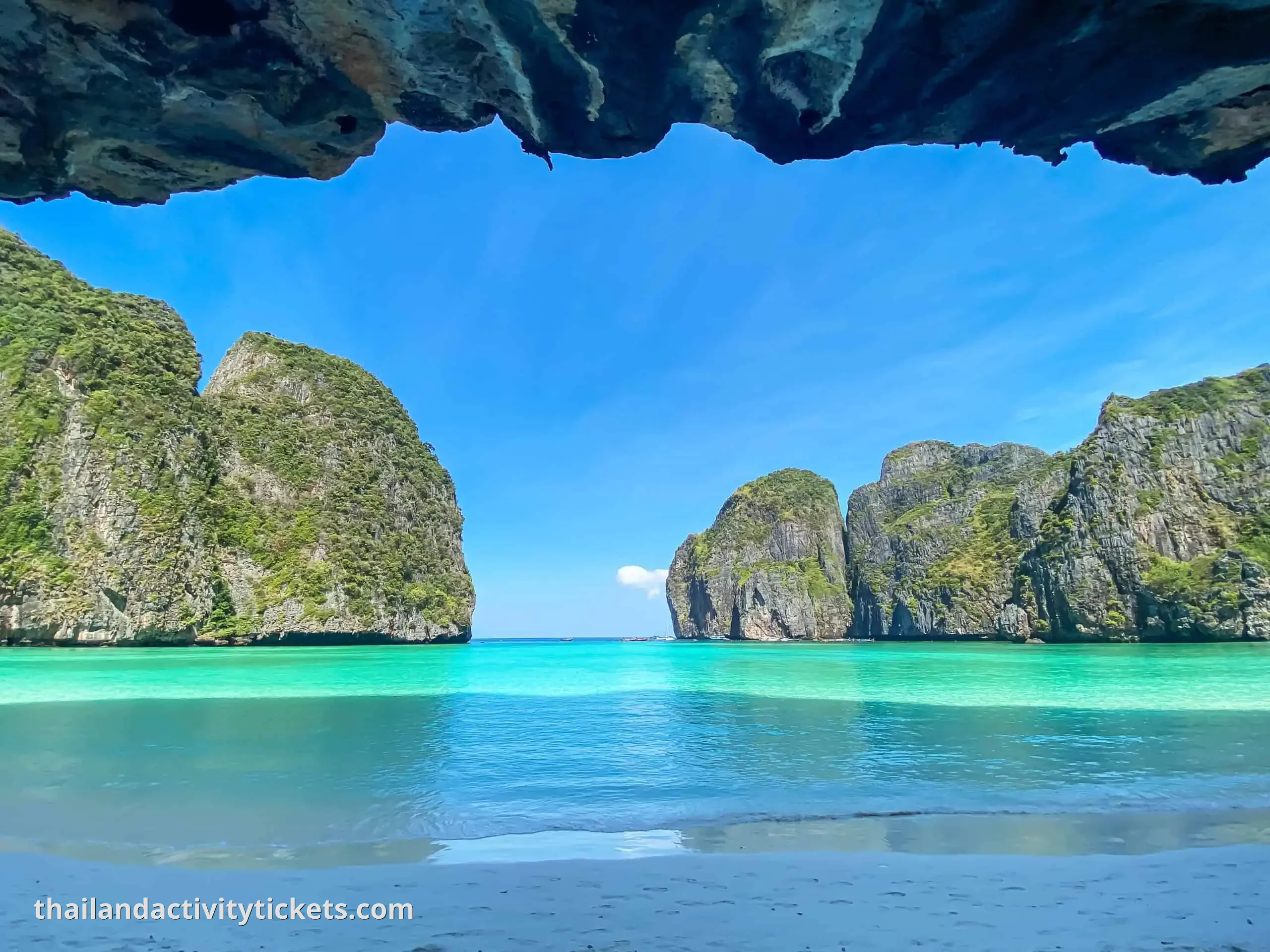 Scenic limestone cliffs and turquoise water on Phi Phi Islands Krabi tour