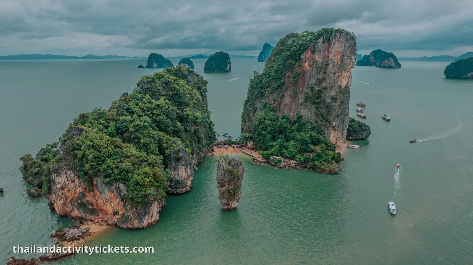 Exploring lagoons by canoe Phang Nga Bay island tour