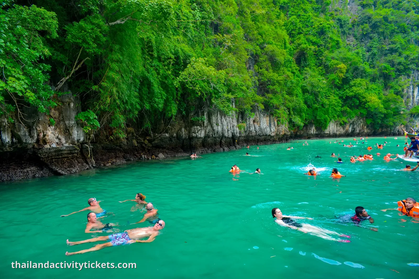Snorkeling in crystal clear waters at Pileh Lagoon Phi Phi Islands