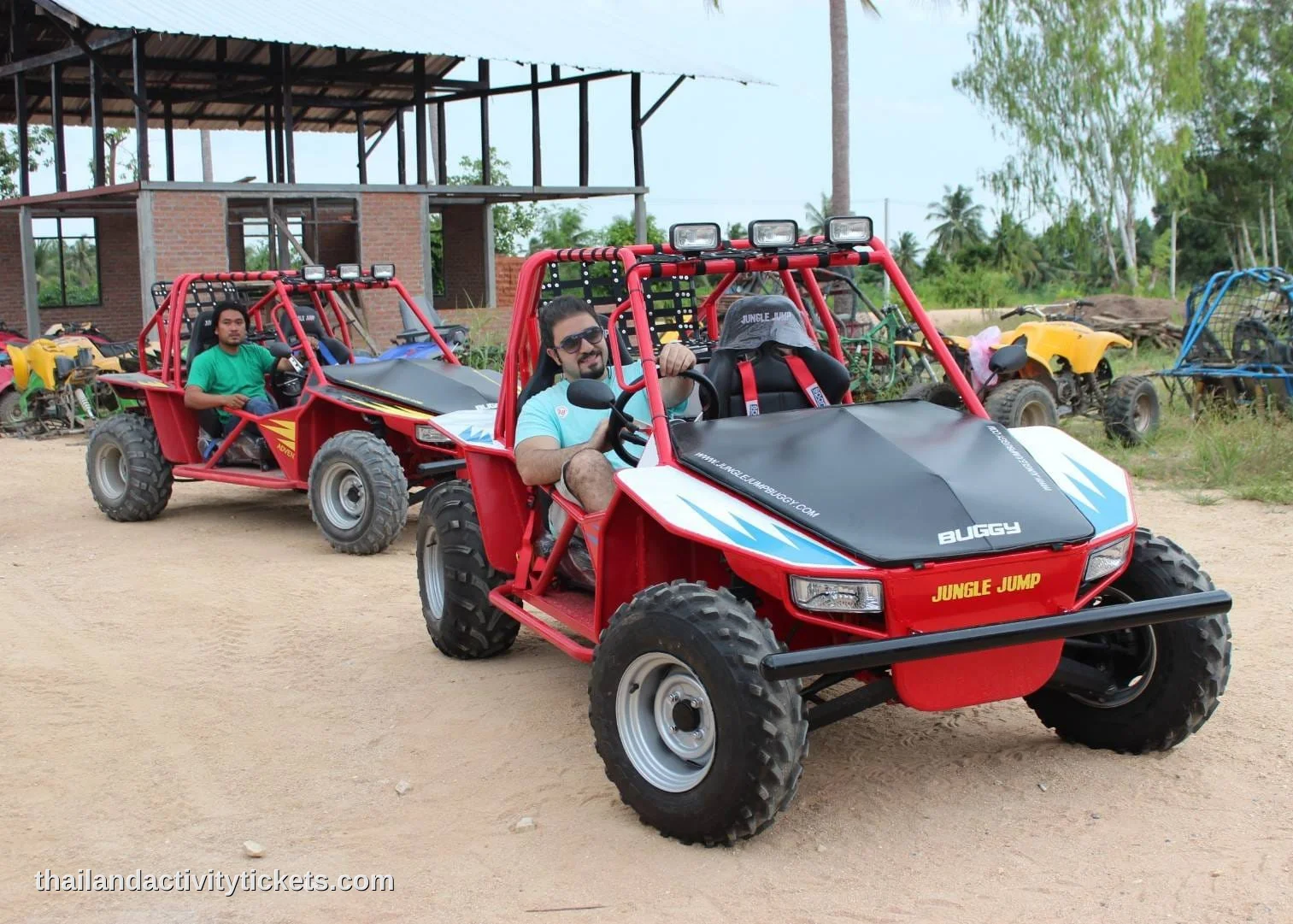 Tourists riding an ATV on the rugged off-road mud tracks at Thappraya Safari Adventure Park