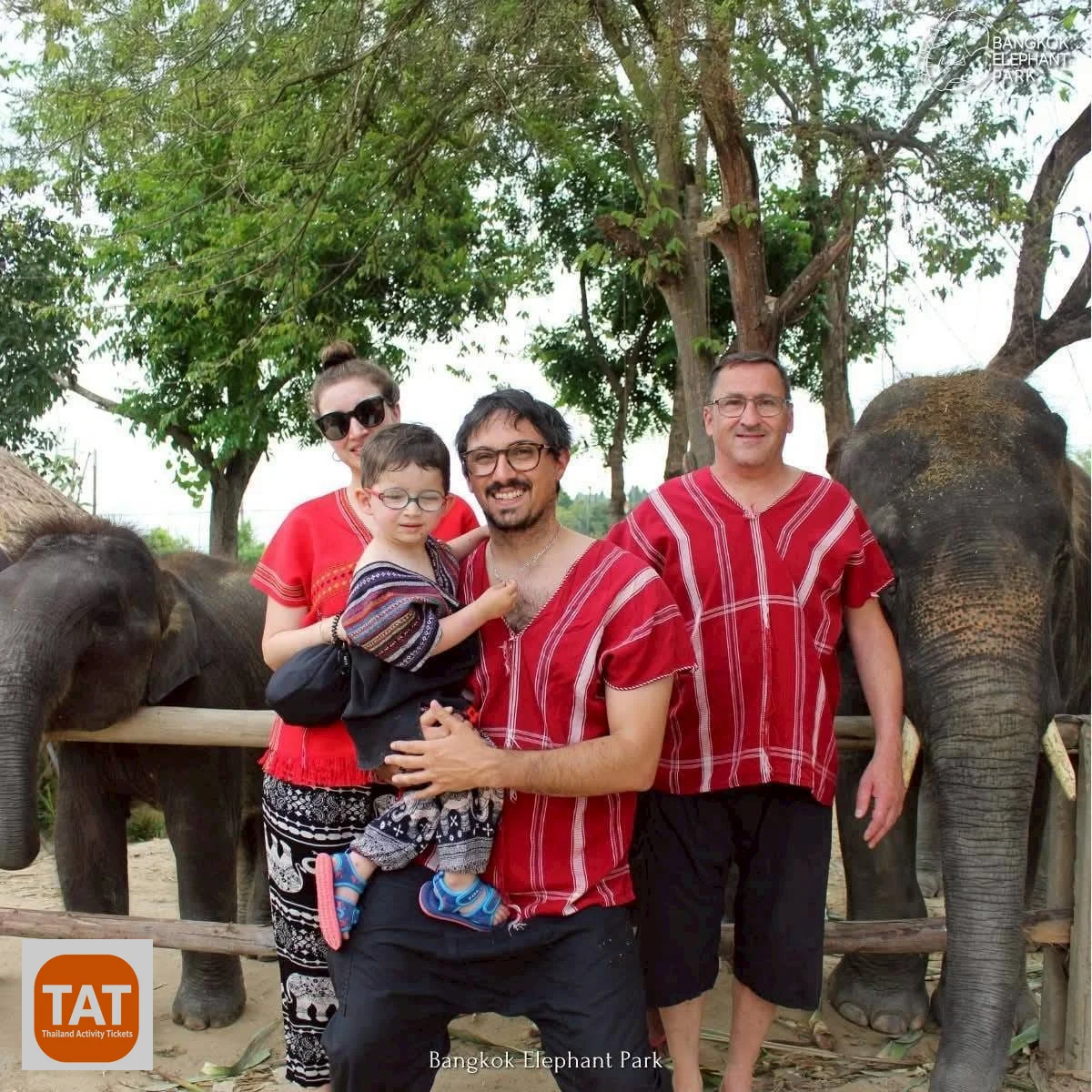 Family visiting elephants at Bangkok Elephant Park Nong Chok