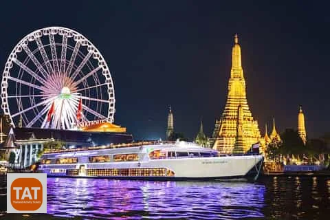 Illuminated Bangkok landmarks viewed from the Chao Phraya River at night