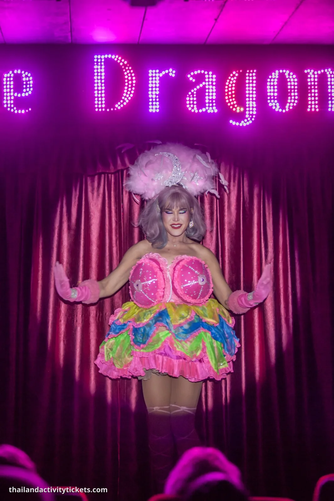 Cabaret performers in glamorous costumes Krabi show