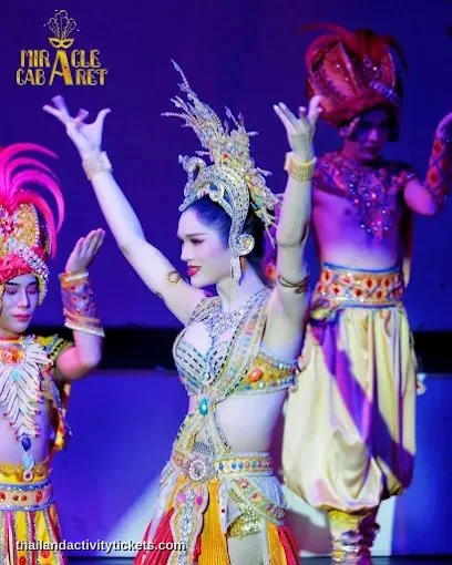 Cabaret dancers wearing glamorous costumes in Chiang Mai show