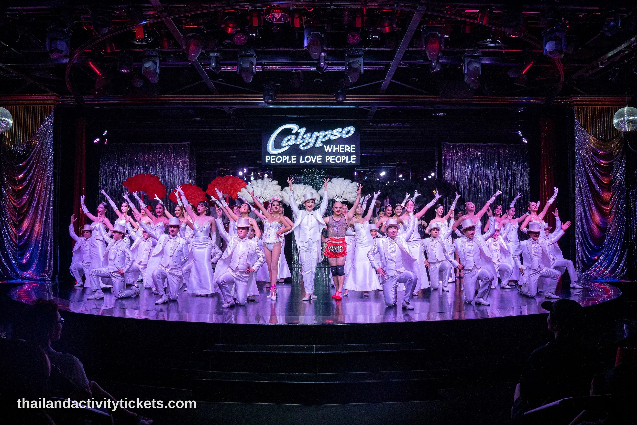 Performers in glamorous costumes at Calypso Cabaret Bangkok