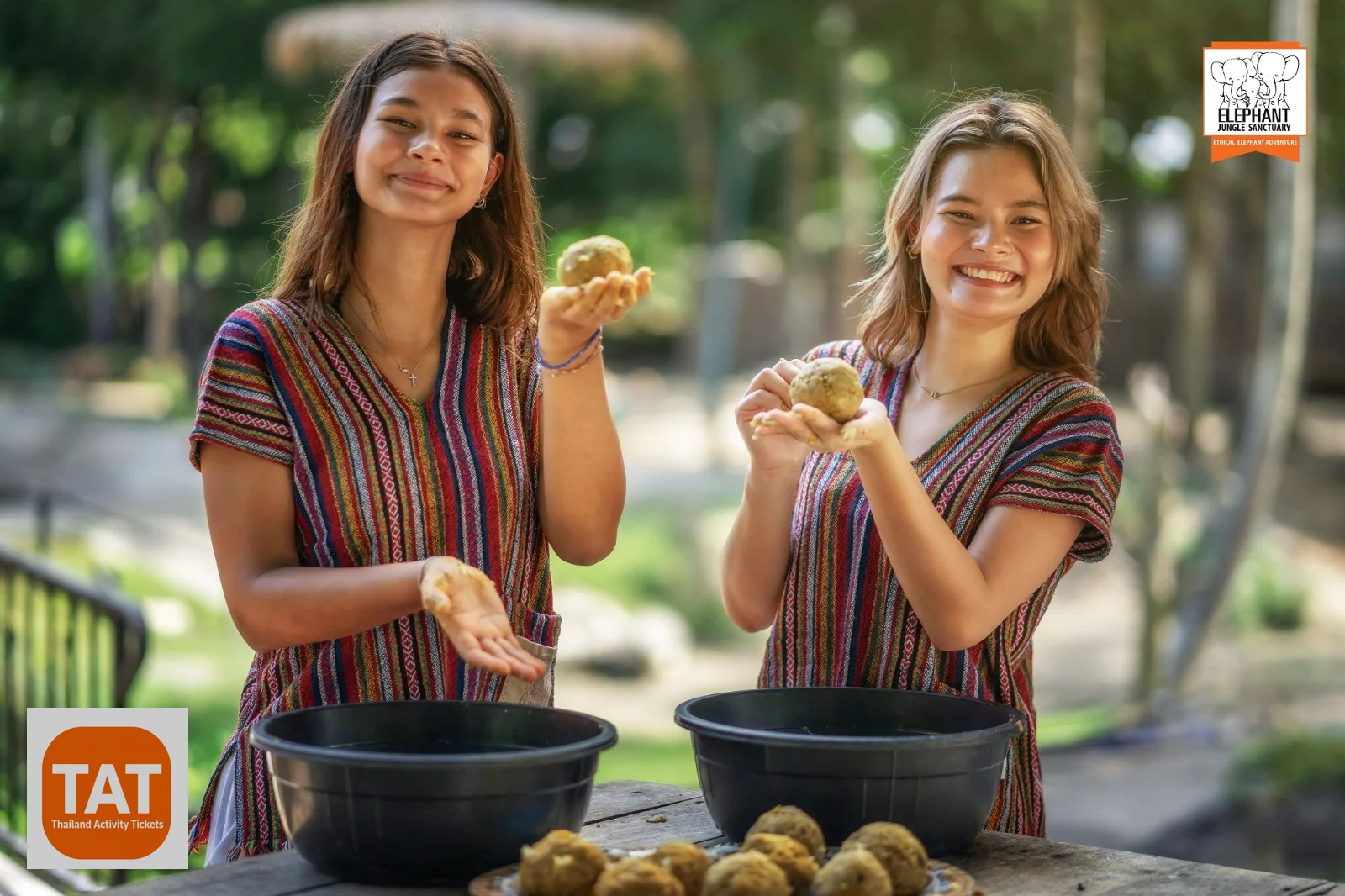 Visitors preparing rice and fruit food balls at Elephant Jungle Sanctuary Samui