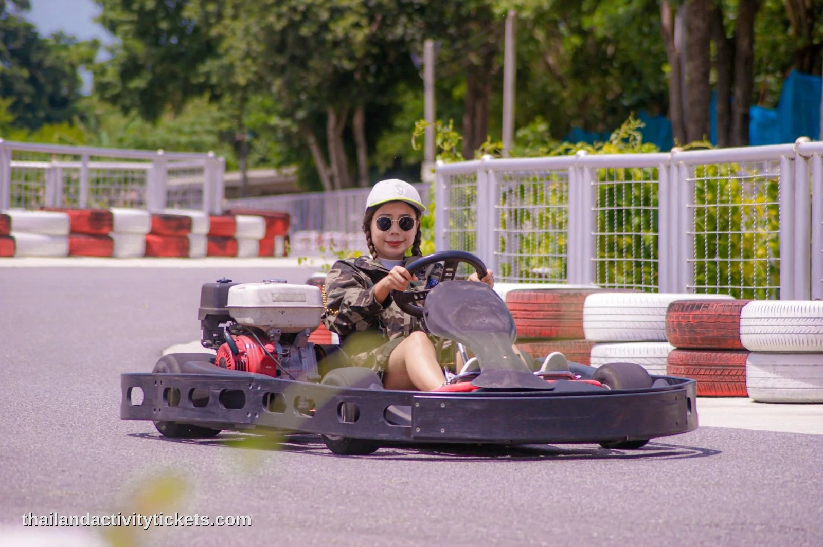 Families racing on the outdoor go-kart track at Changthai Thappraya Safari Adventure Park