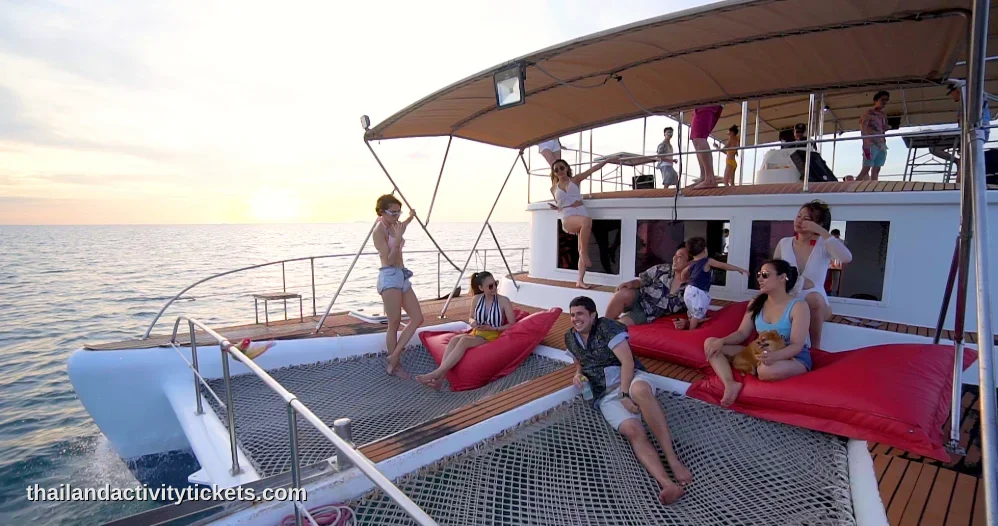 High energy Bollywood dance party on a luxury yacht deck during Pattaya sunset