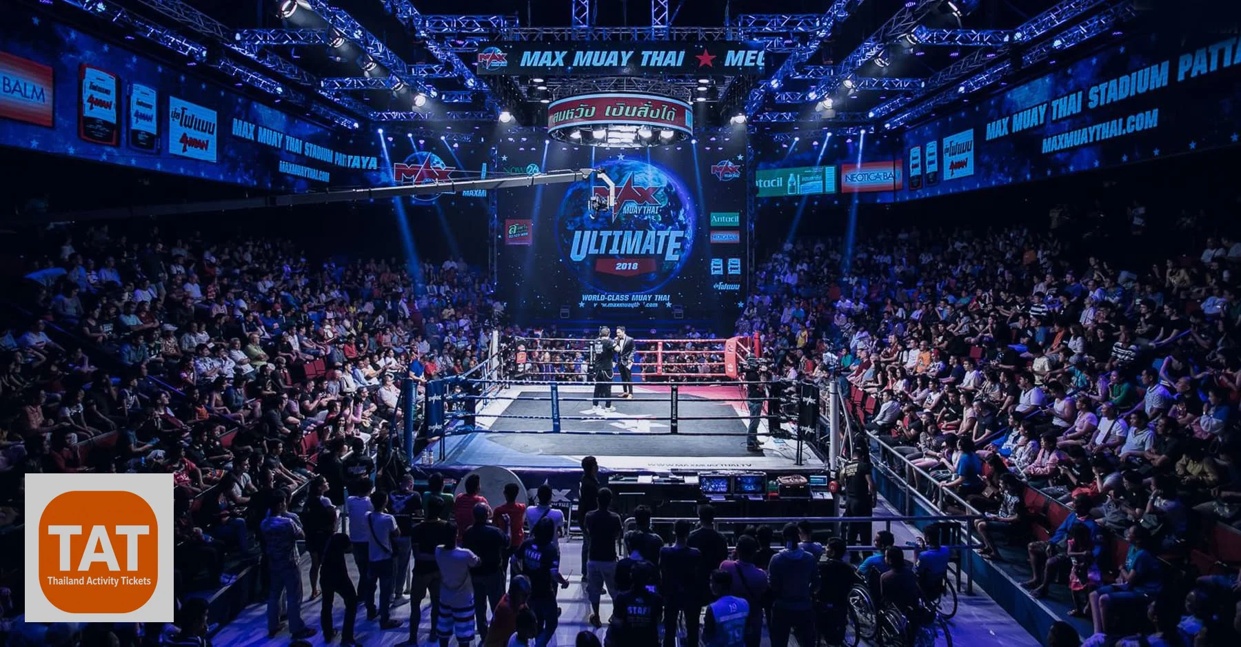 Historic depiction of Muay Thai fighters in a traditional stadium setting