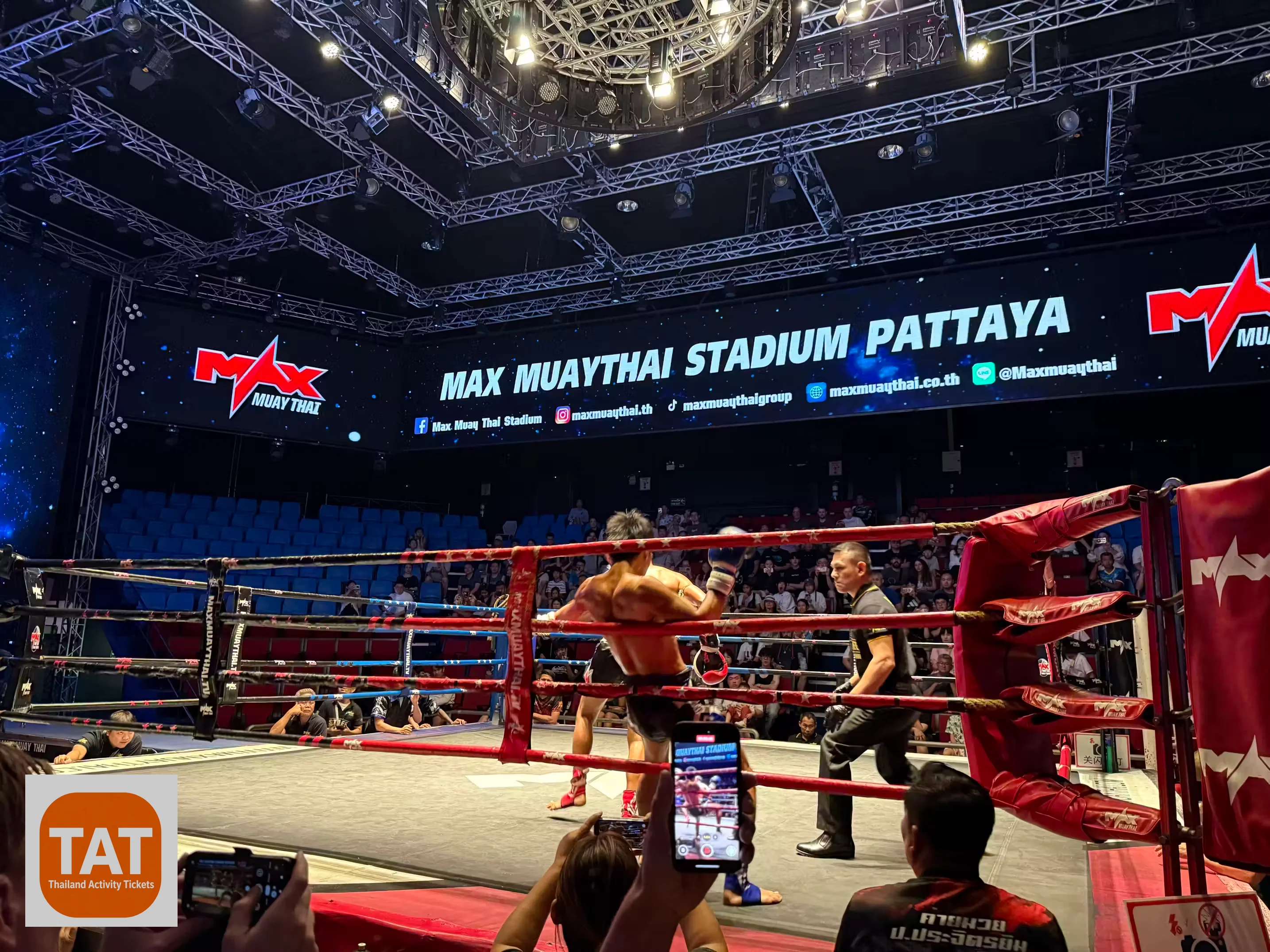 Muay Thai fighter performing the Wai Khru Ram Muay ritual before a bout