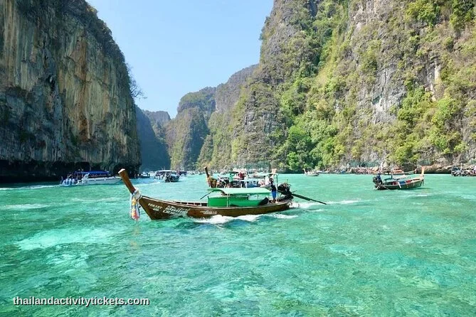 Traditional longtail boat and turquoise waters at Maya Bay, Phi Phi Islands, Phuket