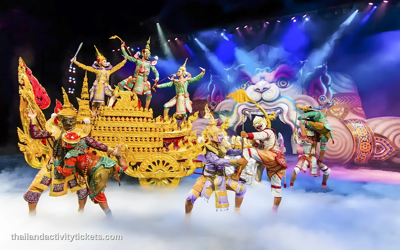 The illuminated facade of the Palace of the Elephants theater at Phuket FantaSea night theme park in Thailand, featuring intr