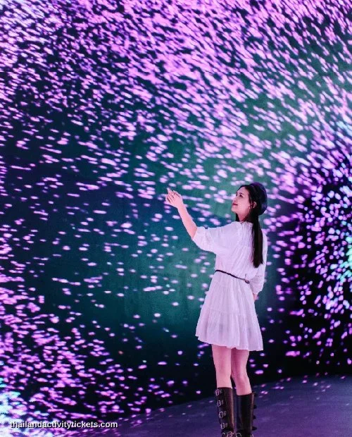 Family enjoying immersive digital attraction at Space and Time Cube Bangkok